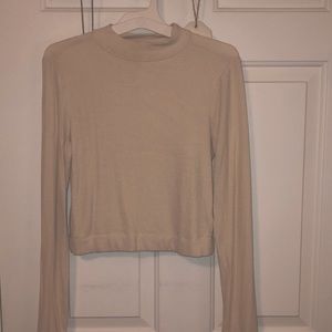 Long sleeve cream cropped mock neck top